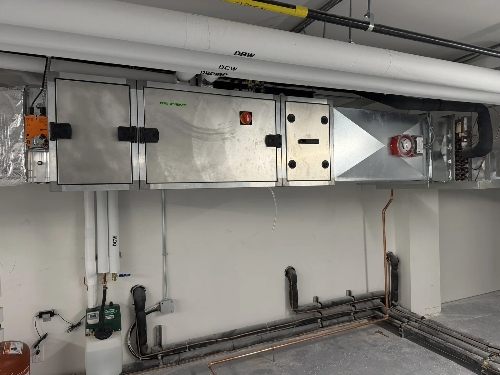 Commercial HVAC Calgary: a make-up air unit with cooling on a TNT commercial job